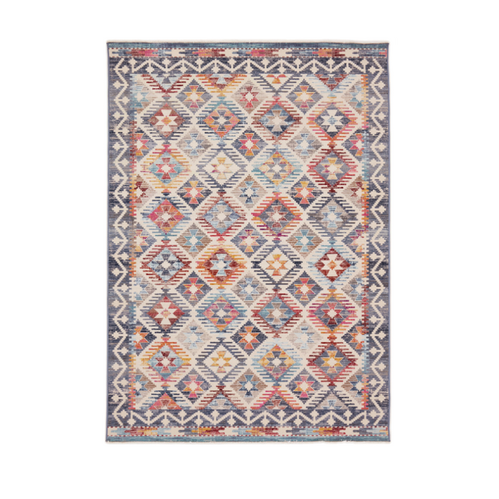 Mohaw Multicolour tæppe med geometriske mønstre og afdæmpede farver, inspireret af Kelim-design.